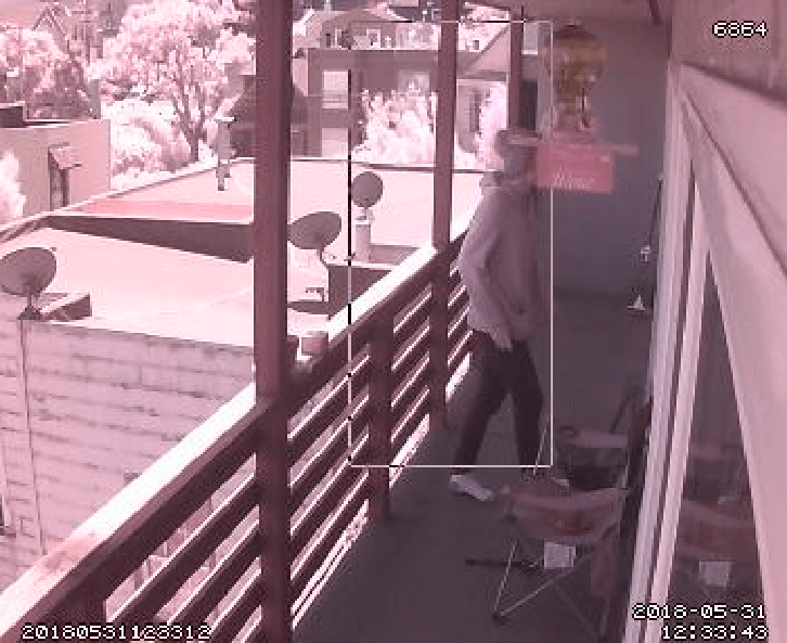 Photo showing a person walking across the frame, as detected by motion capture